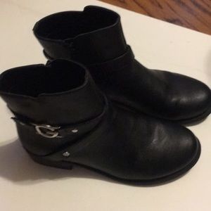 Black boots by Guess